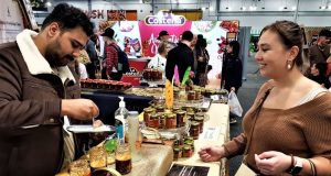Bottled curry sauce creators spice up the displays at culinary event